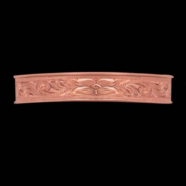 Our Porter Western Cuff bracelet is a blend of rustic charm and timeless Western elegance. Crafted with intricate, hand-engraved scrolls and a gorgeous flower detail on a Copper base.